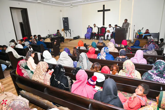 The congregation in their own pews