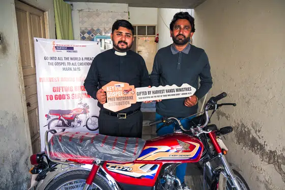 Motorbike distribution to Harvest Hands pastors
