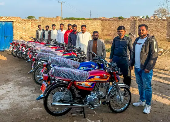 Motorbike distribution to Harvest Hands pastors