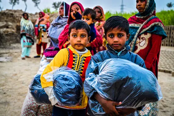 Winter blanket distribution at a brick kiln colony