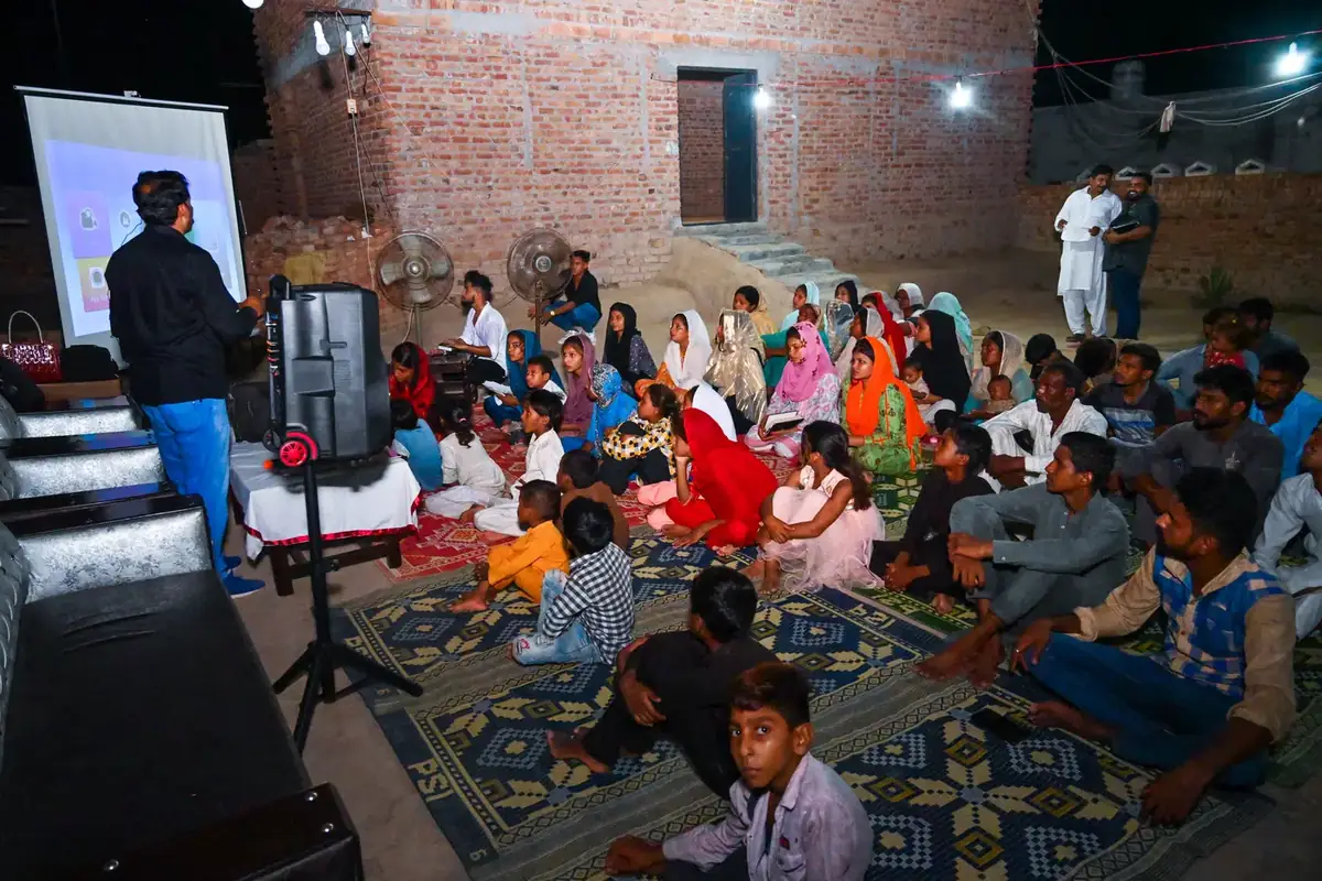 A pastor speaking before the screening begins