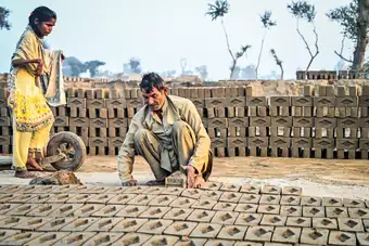 Working at the brick kiln