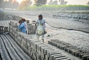 Working at the brick kiln
