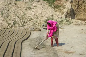 Working at the brick kiln
