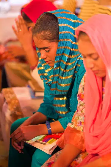 A girl reads the Gospel of John for the first time