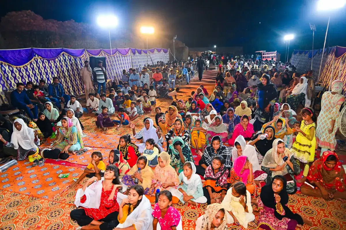 A night meeting under floodlights