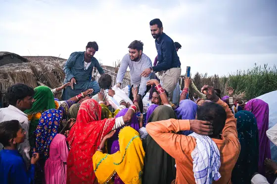 Prayer at a village gathering